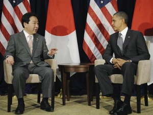 President Barack Obama (right) meets with Japanese Prime Minister Yoshihiko Noda during their bilateral meeting at the APEC Summit in Honolulu, Hawaii, Saturday, November 12, 2011. AP PHOTO/JAPAN POOL