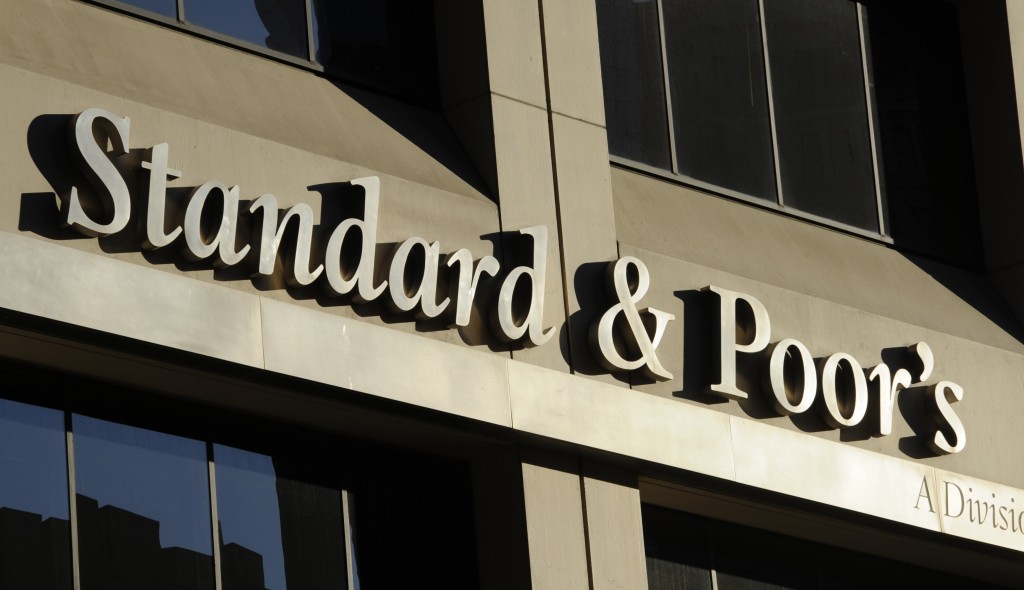 Standard & Poor's Ratings Services upgraded its outlook Monday, June 10, 2013, for the US government's long-term debt but affirmed its credit rating for the country at AA+.  AP PHOTO/HENNY RAY ABRAMS 
