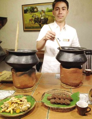 RYAN Alvarez makes “luyang dilaw,” duhat tree bark, or native cocoa drink the traditional way at the herbal tea bar of the “farm-to-table” garden cafe named after heroine Gabriela Silang. 