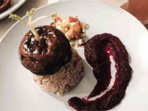 Portobello mushroom with red beet sauce, brown rice and vegetable salad PHOTO BY TESSA R. SALAZAR 