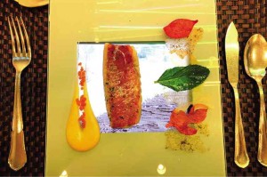  RED mullet on ìwater,î served on a transparent plate placed over  a tablet with a video of splashing water. PHOTOS BY MARGAUX SALCEDO