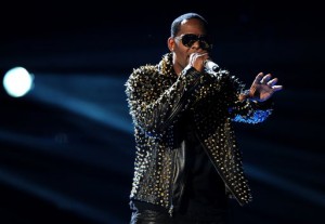 In this June 30, 2013 file photo, R. Kelly performs onstage at the BET Awards at the Nokia Theatre in Los Angeles. The owners of 5001 Flavors knew when they started the company 23 years ago they wanted to sell custom-made clothes to rap and R&B musicians. AP 