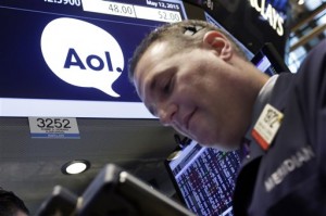 Trader Jonathan Corpina works at the post that handles AOL on the floor of the New York Stock Exchange, Tuesday, May 12, 2015. Wall Street stocks finished lower Tuesday as worries over higher US Treasury bond yields offset Verizon's $4.4 billion takeover of AOL.  AP PHOTO/RICHARD DREW