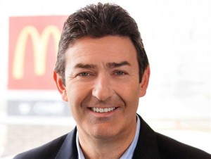 In this January 2015 photo provided by McDonald's, company President and CEO Steve Easterbrook poses for a photo. Easterbrook is set to make his debut before shareholders at the company’s annual meeting Thursday, May 21, 2015, at a time when the chain is facing declining sales and ongoing protests. AP PHOTO
