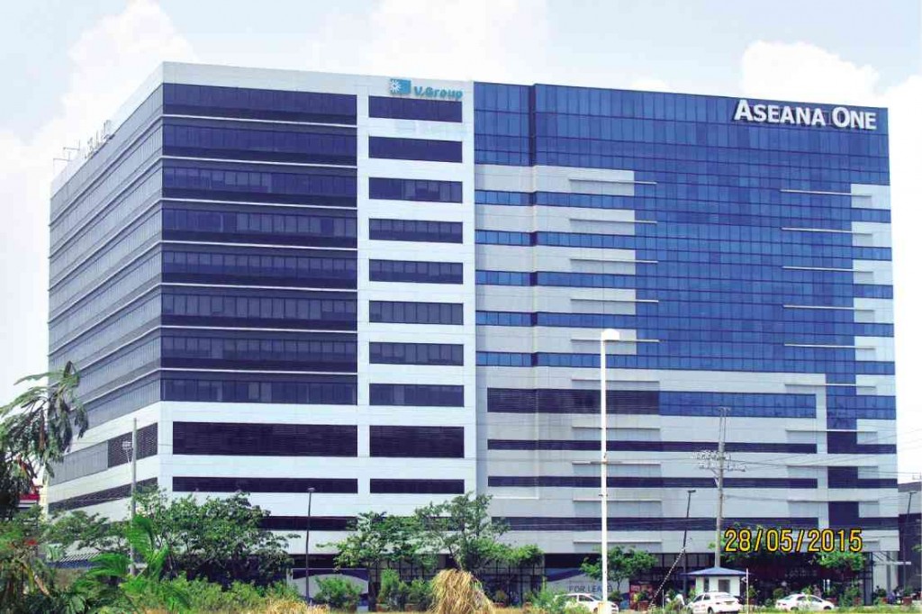 ASEANA II Building with V. Group logo