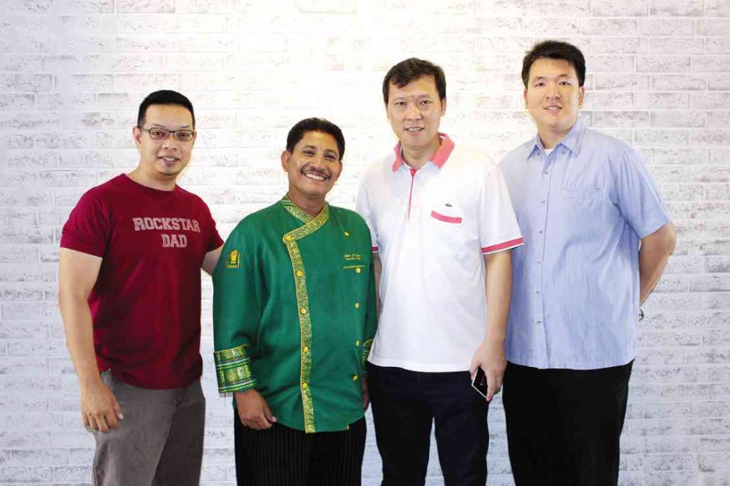  CHEF Boy with his business partners (from left) Karlo Aquino, Kenneth Hung and Jeremy Sy. 