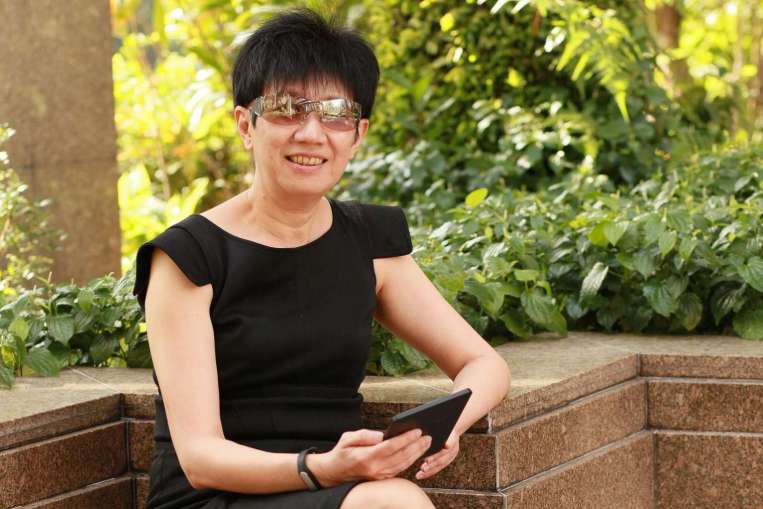 Ms Lim's prudent attitude to handling money stems from her poor family background and her profession as a human resource practitioner, which requires her to interview job candidates.PHOTO: MIKE LEE FOR THE STRAITS TIMES