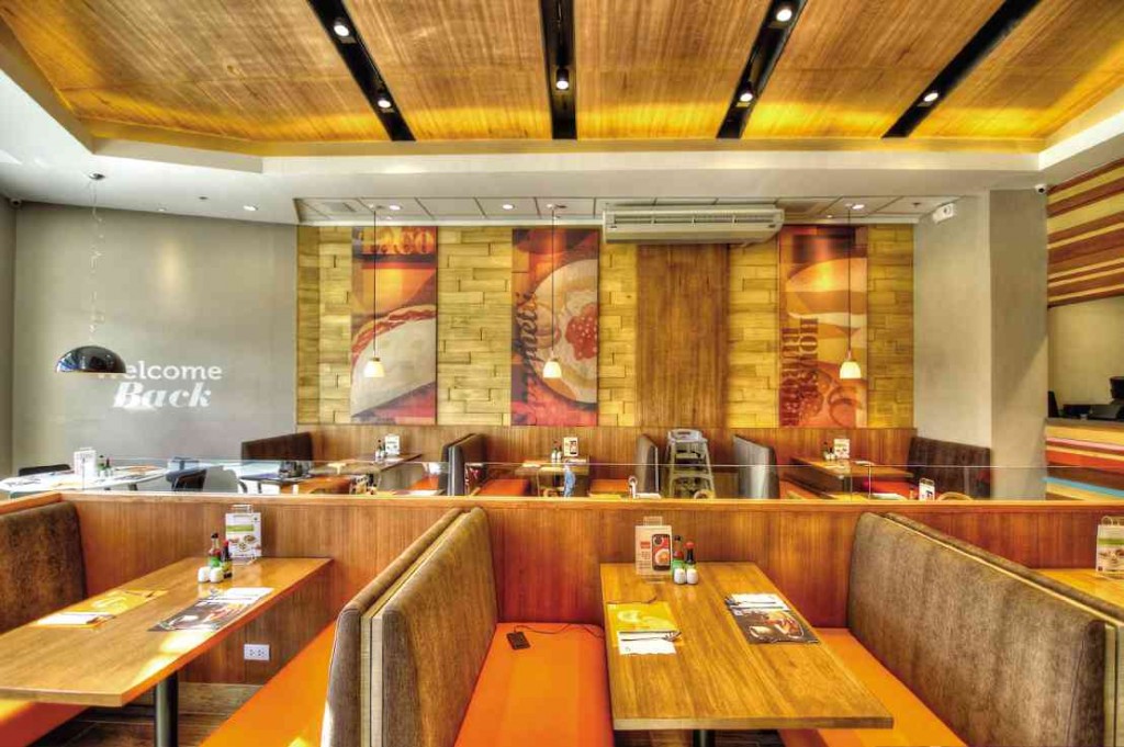 PANCAKE House’s Capitol Commons branch features wood accents, plush furniture and warm lighting. CONTRIBUTED PHOTO 