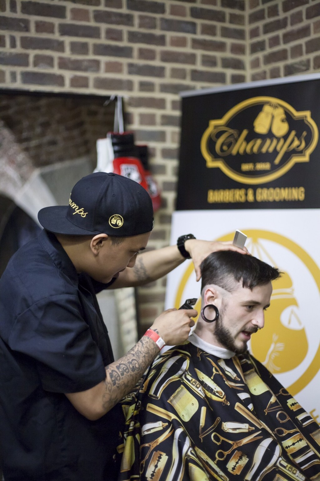 Troy Argones, master barber in Champs Barbers London.
