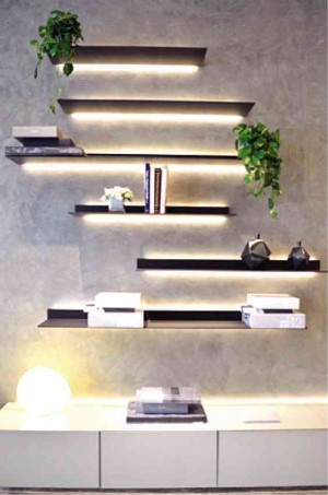 THE LIGHTNESS and strength of aluminum allows display shelves to appear defying gravity. 