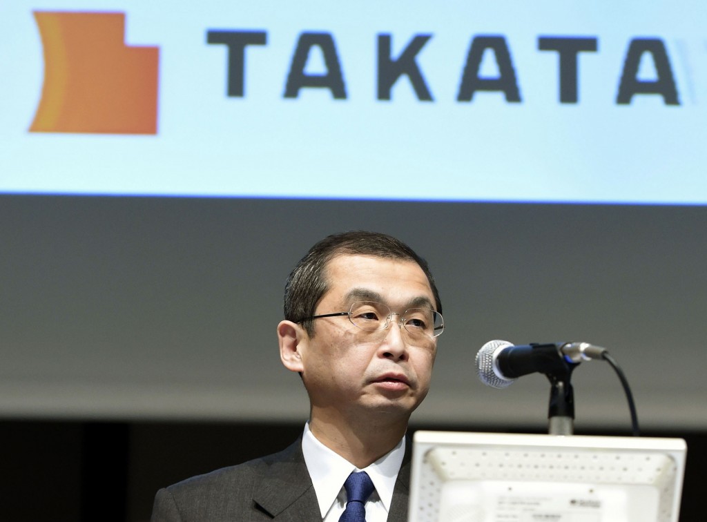 FILE - In this Nov. 4, 2015 file photo, Japanese air bag maker Takata Corp. CEO Shigehisa Takada speaks at a press conference in Tokyo.  Embattled Takata Corp. reported a half-year loss of 5.58 billion yen ($45.8 million) on Friday, Nov. 6, due to recall costs, as Toyota announced it would stop using Takata air bag inflators that are at the center of the company's massive product safety scandal. (Kyodo News via AP, File) JAPAN OUT, MANDATORY CREDIT