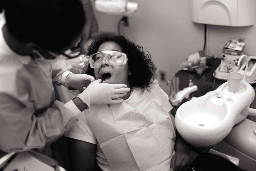 A DENTAL patient having her teeth checked Getty Images/AFP