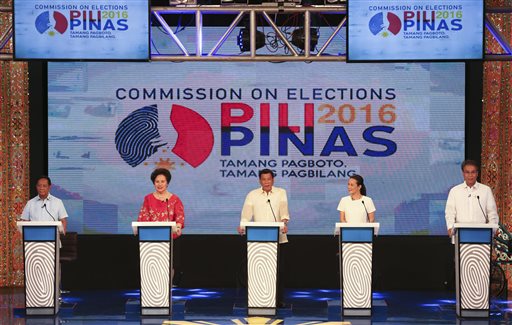 In this Feb. 21, 2016, file image provided by the Philippine Daily Inquirer, from left: Vice President Jejomar Binay; Sen. Miriam Defensor-Santiago; Mayor Rodrigo Duterte of southern Davao city; Sen. Grace Poe; and former Interior Secretary Mar Roxas; listen to a question at a presidential candidates debate held in southern Cagayan de Oro city, southern Philippines. Poe, a political newcomer, leads opinion polls ahead of the May 9 elections, with Binay, close behind. They are followed by Roxas and Duterte in a tight four-way race – a rarity in the Philippines. Lyn Rillon/Philippine Daily Inquirer via AP 