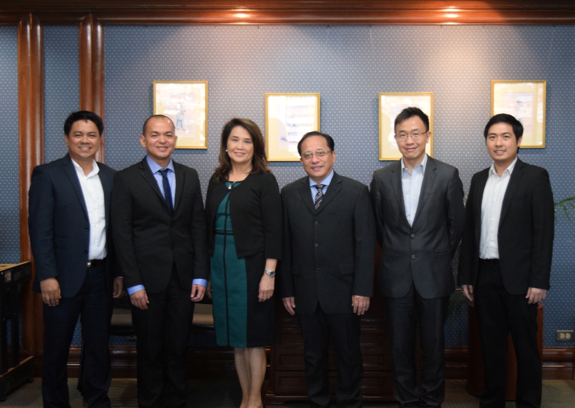 (From left) Mau San Andres, AsiaPay Associate Director; Christian Eugene Quiros, PNB Vice President for Credit Card Group;  Annie Umali, PNB Credit Card Business Head; Bernie Tocmo, PNB Executive Vice President and Head of Retail Banking Group; Joseph Chan, AsiaPay President and CEO and Vincent Jan Santiago, AsiaPay Regional Solution Manager. 