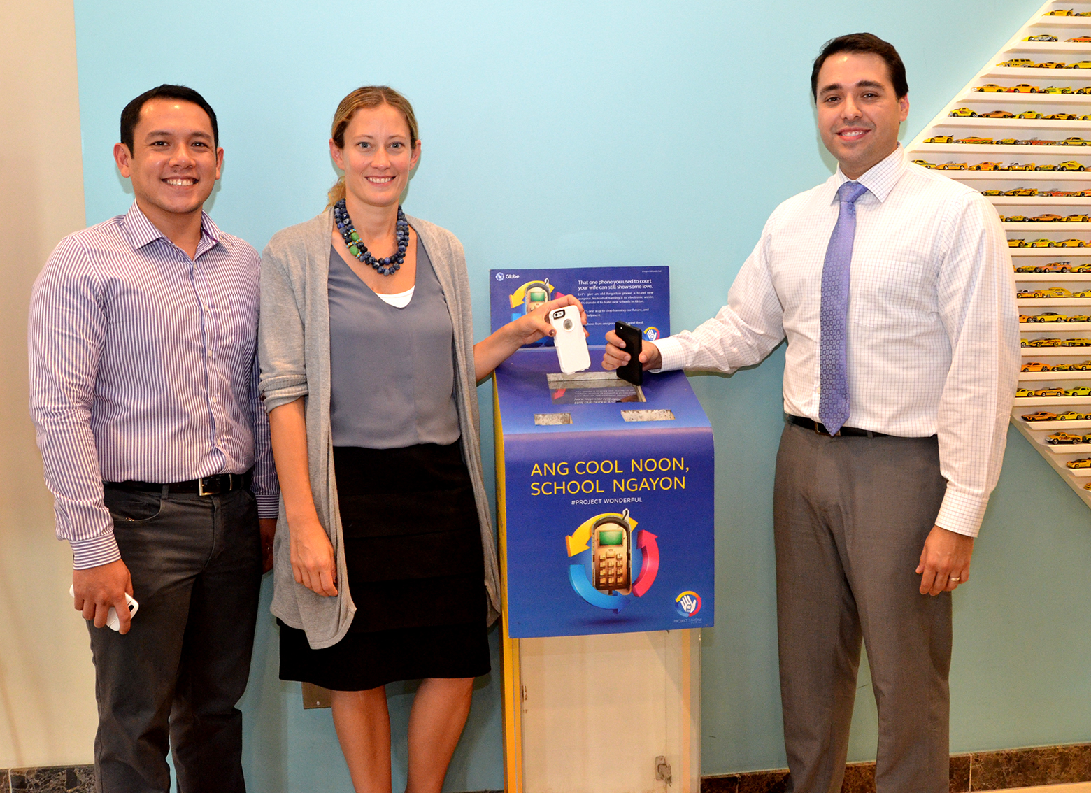 Globe Director for Corporate Social Responsibility Fernando Esguerra (left) joins Fotini Ali, U.S. Embassy Public Affairs associate and Michael Barrera, U.S. Embassy Vice Consul for immigrant visa section as they donate their e-waste.