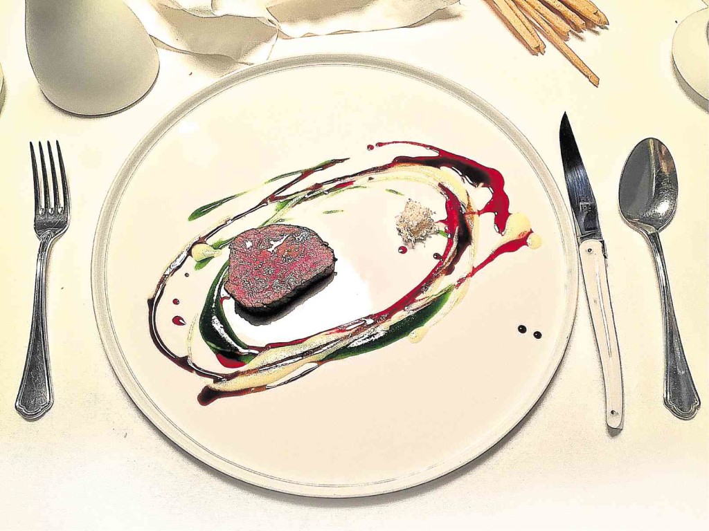 OSTERIA Francescana’s signature “psychedelic veal non-flamed grill” inspired by English artist Damien Hirst.