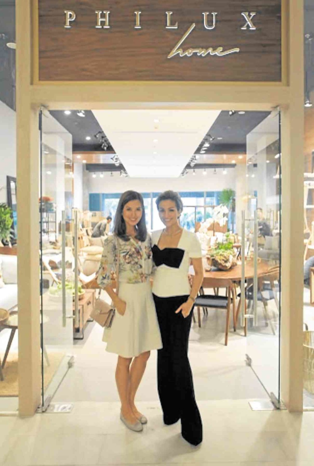 PHILUX Home’s head designer, Jessica Kienle Maxwell, and Stephanie Kienle Gonzalez, vice president for sales and business development