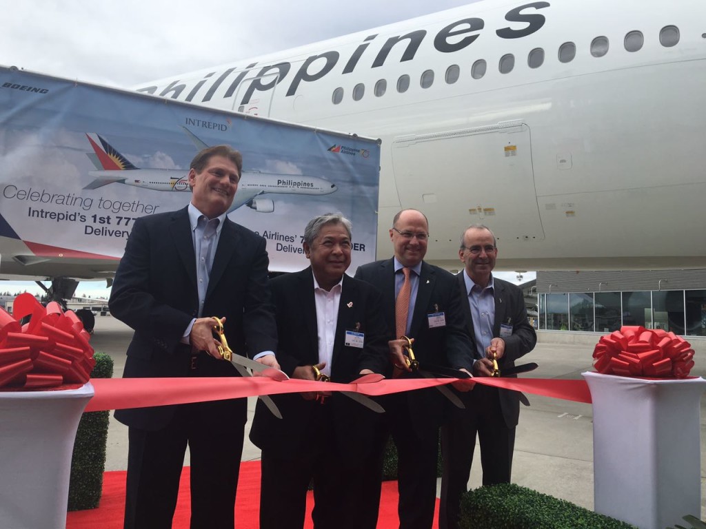  At ribbon-cutting ceremony prior to the ferry flight at the Everett Delivery Center in Seattle: from left PAL president and chief operating officer Jaime Bautista, Jeff Klemann, vice president of the Everett Delivery Center and operations for Boeing; Doug Winter, president and chief commercial officer for Intrepid Aviation and Gerry Aubrey, senior vice president for new airplane programs of Boeing. 