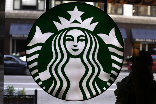  This Saturday, May 31, 2014, file photo, shows the Starbucks logo at one of the company's coffee shops in downtown Chicago. AP 
