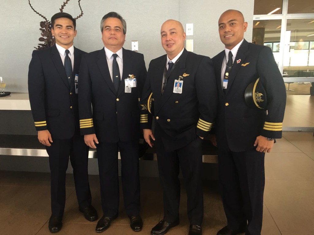 The flight crew: from left: Second Officer James Kevin Conner and his father pilot in command Capt. James Conner, second in command Joel Dee Tuan Bio and first officer Terence Ragasa