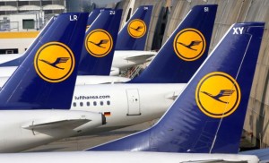 Tails of parked Lufthansa planes