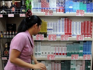 Cigaretts and liquor sold at a supermarket. (AFP FILE PHOTO)