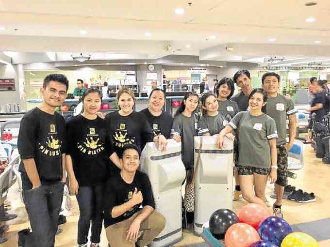 Employees of Sta. Lucia Ventures enjoying a game of bowling with Tuason-Magpoc