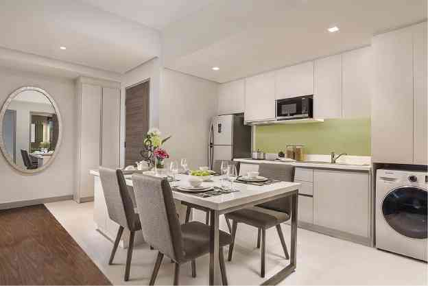 Serviced residences feature complete kitchen amenities.