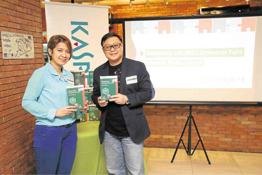 Marilen Young, consumer sales and marketing manager of iSecure Networks and Anthony Chua