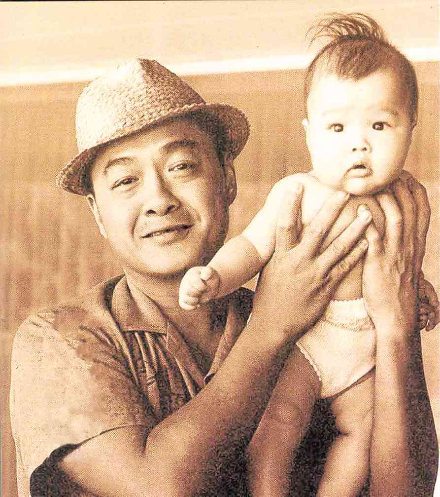 A young John Gokongwei Jr. with his only son, Lance.