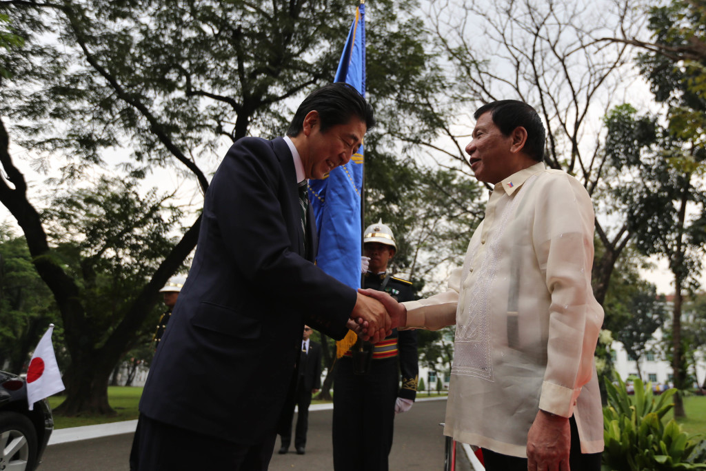 President Rodrigo Roa Duterte welcomes Japanese Prime Minister Shinzo Abe to the Malacañan Palace on January 12, 2017. The Prime Minister of Japan is scheduled for a two-day visit to the country. KING RODRIGUEZ/Presidential Photo