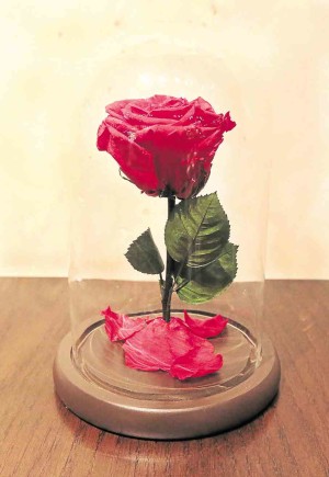 The red rose arrangement was inspired by the movie “Beauty and the Beast.”