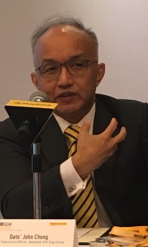 Maybank Kim Eng CEO Dato John Chong speaking at the Invest ASEAN forum in Singapore