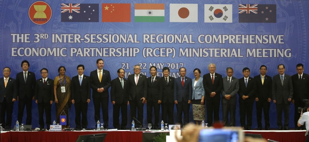 Trade ministers of 16 countries from the Asia-Pacific region stand for a group photo during the Regional Comprehensive Economic Partnership (RCEP) ministerial meeting in Hanoi, Vietnam on Monday, May 22, 2017. The ministers gather in Hanoi to speed up finalization of the China-led trade agreement by the end of this year. AP