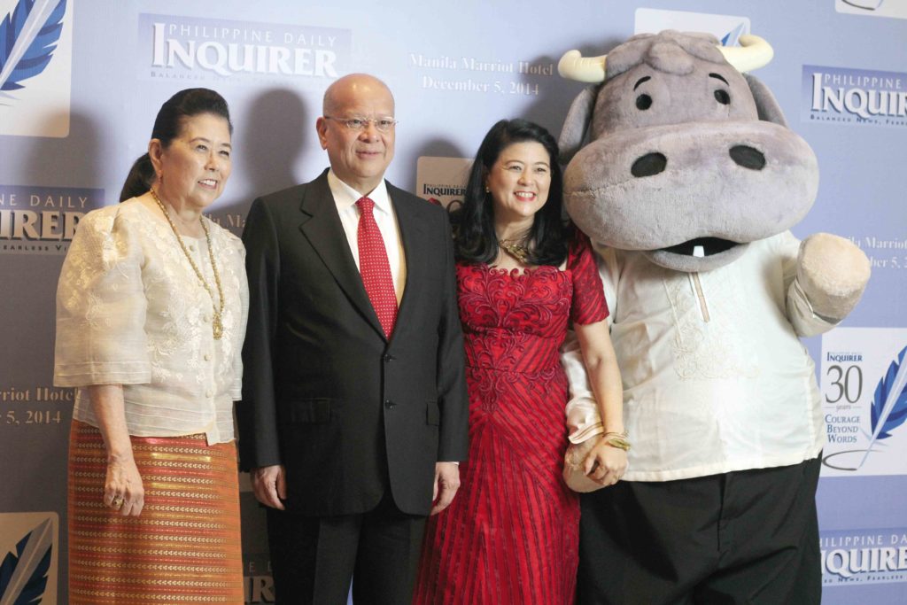 STRATEGIC DECISION Inquirer chair Marixi R. Prieto (left) says the purchase of the company by Ramon S. Ang (center) is a strategic business decision that will ensure the newspaper’s growth. At right is Inquirer president/CEO Sandy Prieto-Romualdez.  —INQUIRER FILE PHOTO