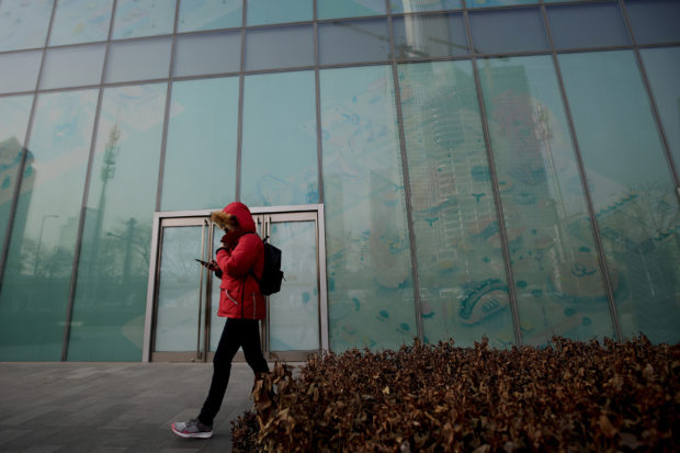China slump squeezes workers, hammers consumer spending