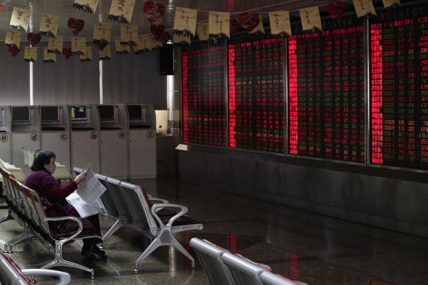 China shares lifted by stimulus hopes, optimism on trade