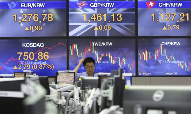  World shares mixed as China targets 6-6.5 pct growth in 2019