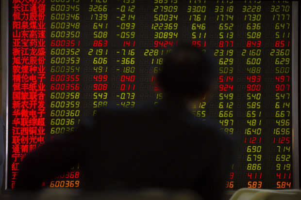 Asian stocks modestly higher in quiet holiday trading