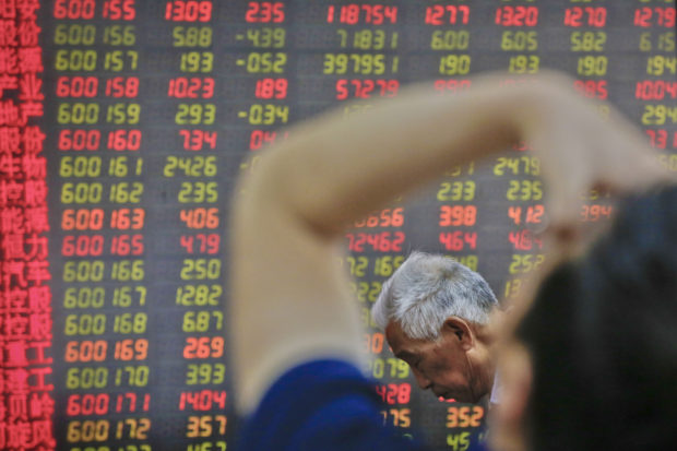 World shares take breather from trade row, NY futures gain