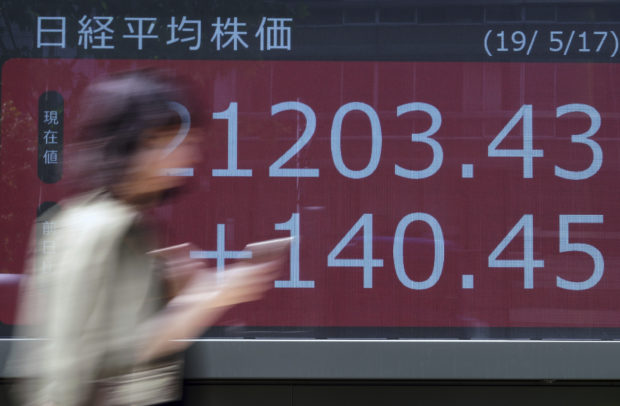  Asian shares mixed as Huawei sanctions stir trade fears