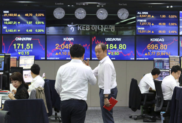  Asian shares mixed as markets await news on China-US trade