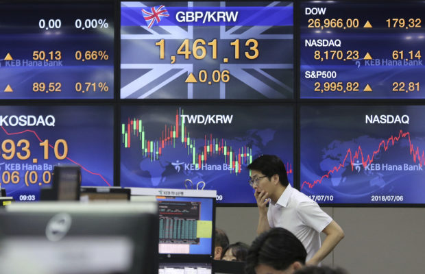 Asian shares climb after US benchmarks hit record highs