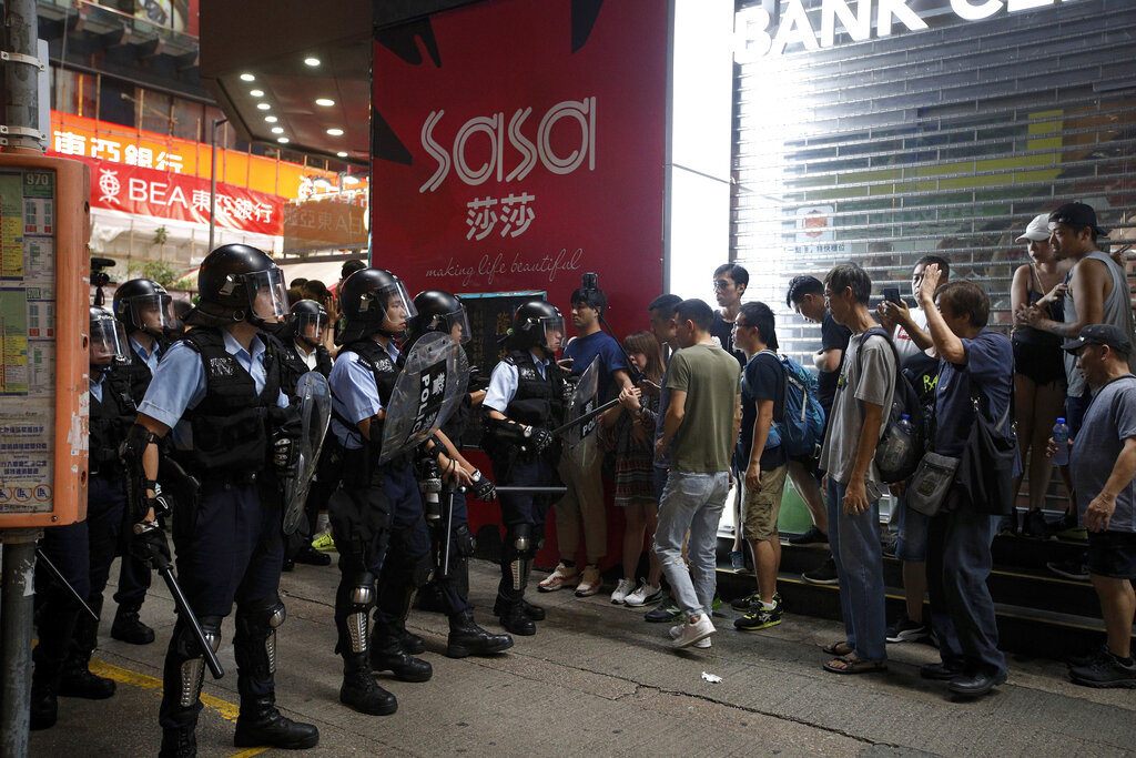 Hong Kong protests augur murky outlook for financial hub
