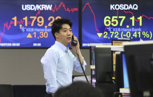  Asian shares higher, Korean Kospi dives after missile launch