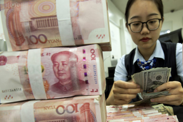 Trade war tensions ease a bit as China stabilizes currency