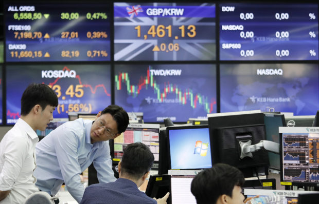 Asian stocks rebound after volatile Wall Street day