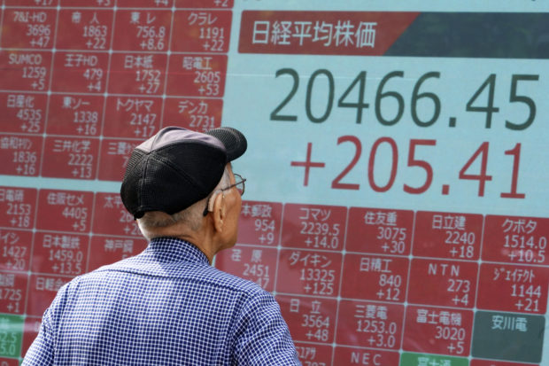  Asian shares mostly up on optimism about US-China trade war