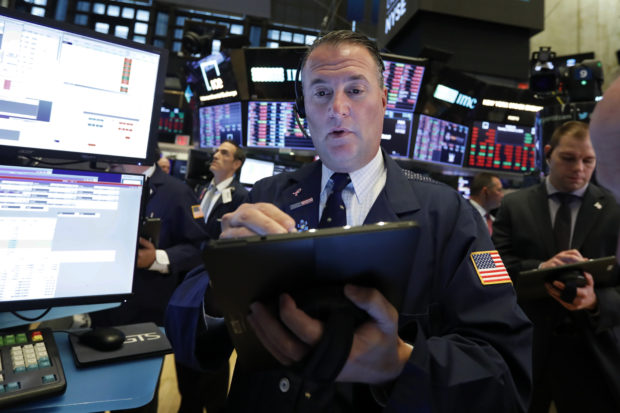  Stocks skid on Wall Street as tensions flare ahead of US-China trade talks