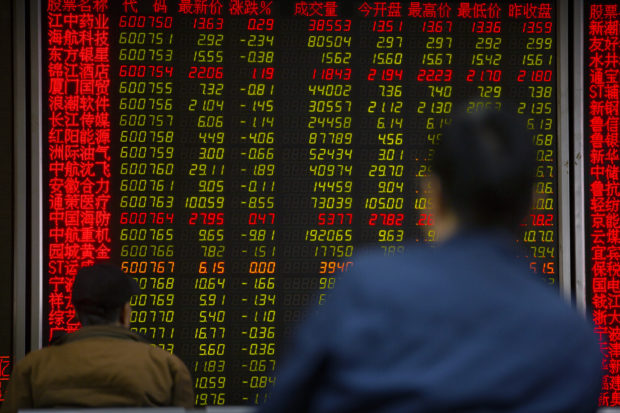  Asian shares mostly lower following Wall Street losses